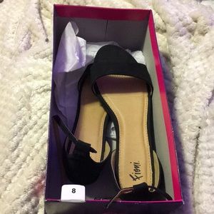 Black open toe flats will a little hill